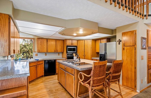 Liberty Lake Casa | Unique lakefront hideaway with four decks, dock, private hot tub & wood stove