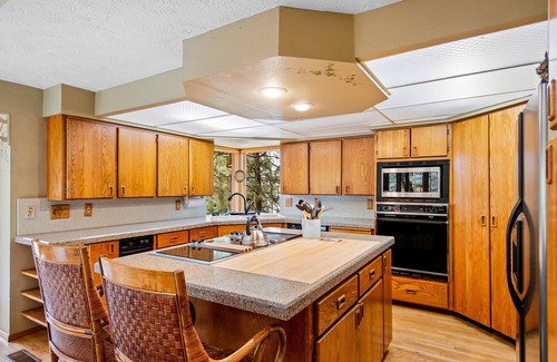 Liberty Lake Casa | Unique lakefront hideaway with four decks, dock, private hot tub & wood stove