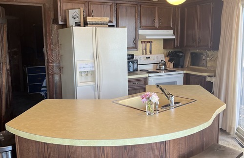 Howe Cabaña | Unique Lakeside Retreat with Pedal Boat for a Relaxed, Pet-Friendly Getaway!