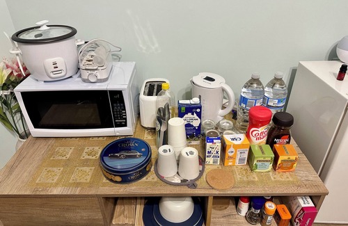 Somerville Casa | Unit In The House - 5 minutes from Airport (Not suitable for Families with kids)