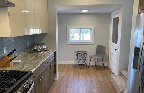 Walloon Lake Casa | Updated 5 Bedroom Walloon Lake Village Home! Walk to Walloon Lake!