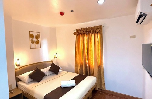 Puerto Princesa City Centre Hotel | Upgrace Inn
