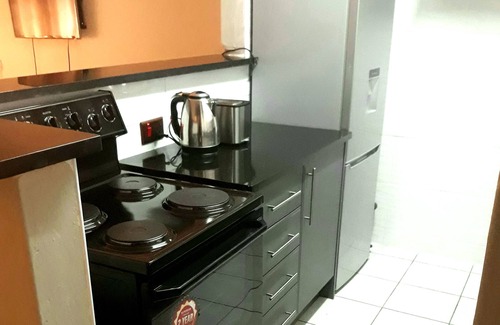 Harare Apartamento | Exclusivo y urbano cálido de buen gusto apartamento de 1 cama.