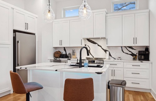 Haynes Area Casa | Upscale Multi-Level Home | Rooftop & Game Room Fun