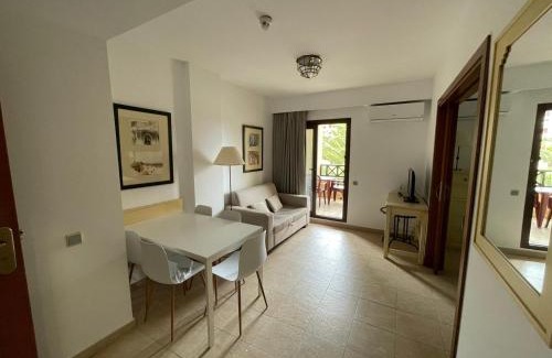 Punta del Moral Apartamento | Urbanización Jardines de Isla canela vista jardín By SIT