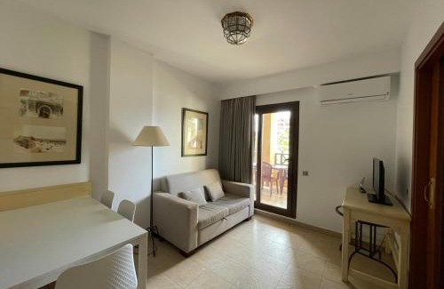 Punta del Moral Apartamento | Urbanización Jardines de Isla canela vista jardín By SIT