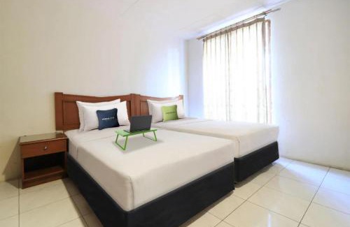 Kemang Hotel | Urbanview Mroom PH Kemang