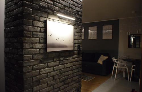 Stare Miasto District Apartamento | Uroczy apartament z widokiem i darmowym parkingiem