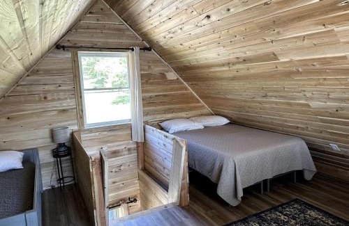 Portage Lake Casa | Magnificent Cabin Nestled Amidst Trees in Portage Lake, Maine