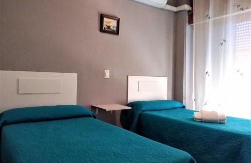 Cullera Casa | Vacansis Habitaciones de Hostal a Primera linea de playa en Cullera