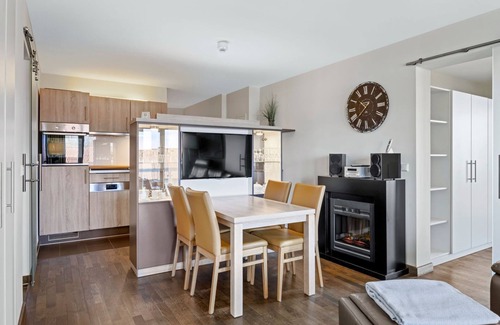 Wremen Apartamento | Vacation apartment near the beach with sauna and great, covered balcony with dyke view