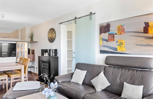 Wremen Apartamento | Vacation apartment near the beach with sauna and great, covered balcony with dyke view