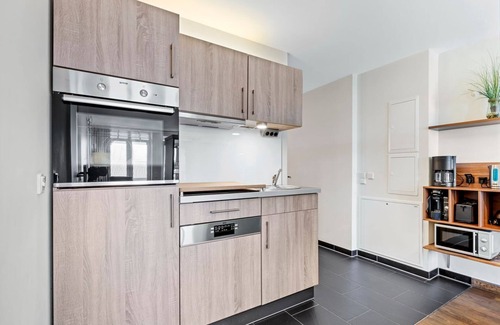 Wremen Apartamento | Vacation apartment near the beach with sauna and great, covered balcony with dyke view