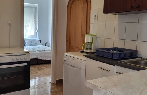 Balatonmariafurdo Apartamento | Apartamento con piscina justo en el lago