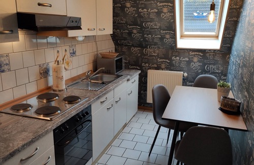 Dornumergrode Apartamento | Casa de huéspedes Zur alten Post West apartment
