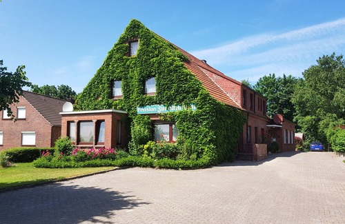 Dornumergrode Apartamento | Casa de huéspedes Zur alten Post West apartment