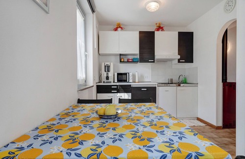 Dorsino Apartamento | Apartamento de vacaciones Ciclamino Standard Vittoria con vistas a la montaña, Wi-Fi y jardín