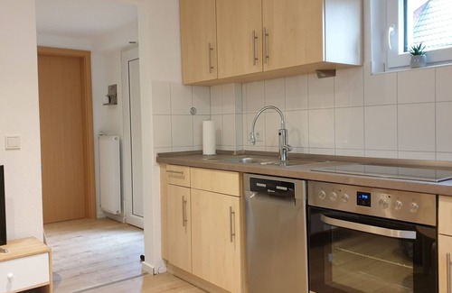 Nordseebad Burhave Apartamento | Vacation apartment Meermuschel in Burhave for 2-4 pers. with garden and barbecue by the sea