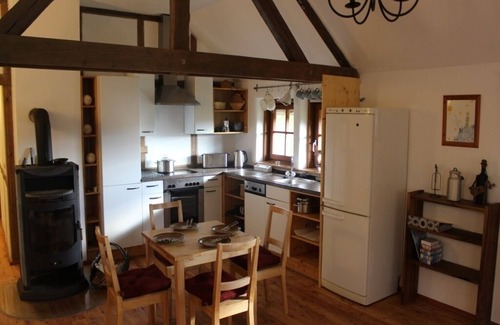 Pfarrweisach Apartamento | Vacation apartment (58sqm) with fully equipped kitchen and Swedish stove