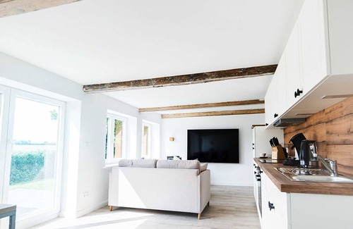 Rabenkirchen-Faulueck Apartamento | Vacation apartment Kompass in the country house - Jensen & Doering Holiday Resorts in Kappeln