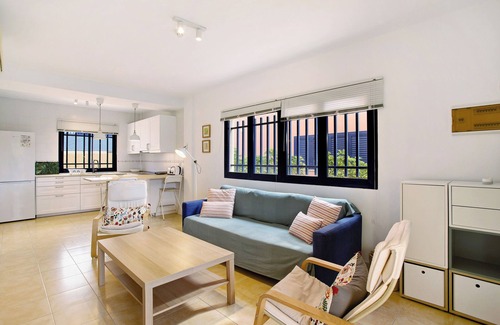 Costa Meloneras Apartamento | Apartamento de vacaciones 'Meloneras 1' con piscina compartida, Wi-Fi y aire acondicionado
