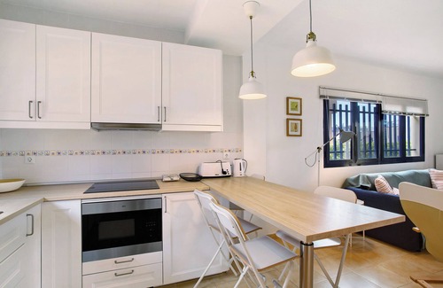 Costa Meloneras Apartamento | Apartamento de vacaciones 'Meloneras 1' con piscina compartida, Wi-Fi y aire acondicionado
