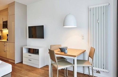 Bensersiel Apartamento | Vacation apartment near the beach with terrace incl. free use of swimming pool & sauna