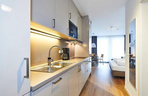 Bensersiel Apartamento | Vacation apartment near the beach with terrace incl. free use of swimming pool & sauna