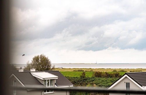 Schillig Apartamento | Vacation apartment with private sauna, fresh sea air and magnificent sea views