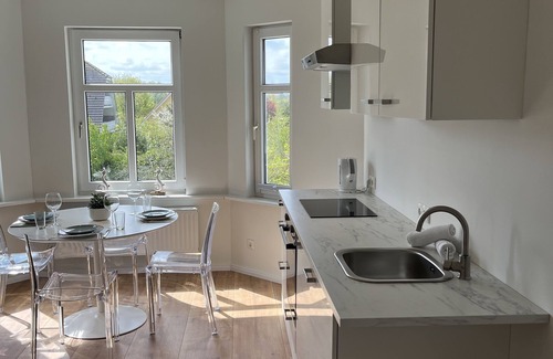 Kalifornien Apartamento | Vacation apartment with sea view directly behind the dyke in California on the Baltic Sea