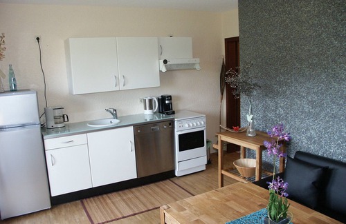 Anraff Apartamento | Apartamento con terraza, naturaleza exuberante y un ambiente agradable para sentirse bien.