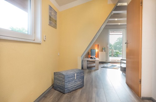 Demen Casa | Apartamento con terraza en la azotea con una vista idílica del lago del pueblo.