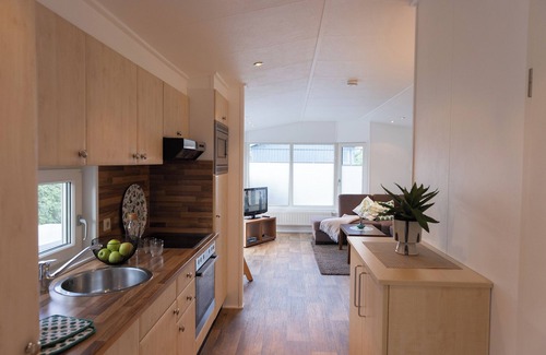 Dorumer Neufeld Casa | Vacation bungalow Mellumplate 12 with sun terrace and ground floor