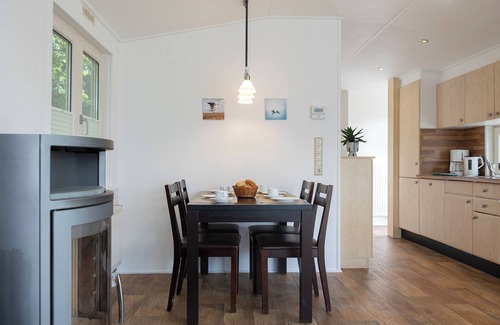 Dorumer Neufeld Casa | Vacation bungalow Mellumplate 12 with sun terrace and ground floor