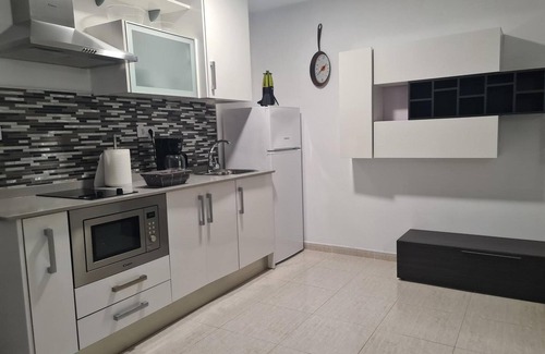 Playa de Arinaga Apartamento | Vacaciones 'Casa Paula - 22' con vistas a la montaña, piscina compartida y Wi-Fi