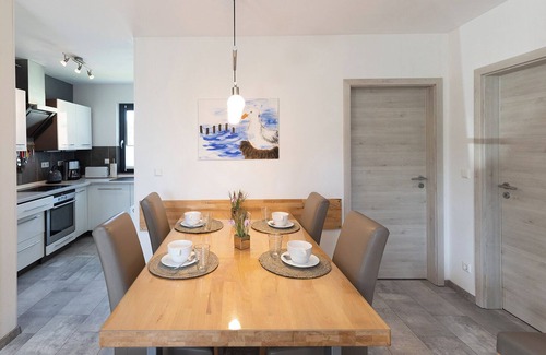 Dorumer Neufeld Casa | Vacation home Möwennest. With sun terrace and at ground level.