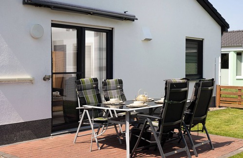 Dorumer Neufeld Casa | Vacation home Möwennest. With sun terrace and at ground level.