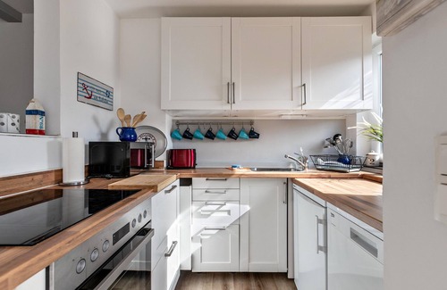 Busumer Deichhausen Casa | Casa de vacaciones "Deich Hus" con terraza privada, jardín y Wi-Fi
