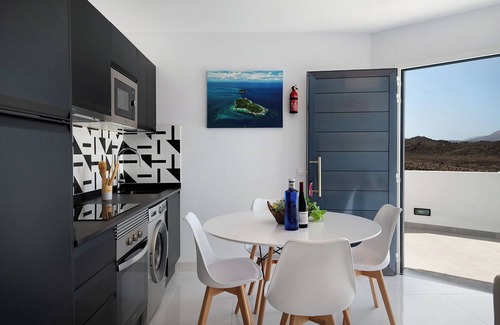 La Santa Casa | Casa de vacaciones 'Coral 5' con terraza compartida, Wi-Fi y aire acondicionado
