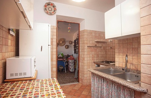 Porto Pino Villa | Casa de vacaciones 'Fronte Mare Al Porticciolo' con vistas al mar, zona de barbacoa y Wi-Fi