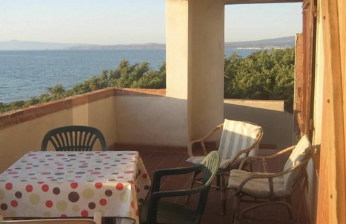 Sa Rocca Tunda Casa | Casa de vacaciones "Il suono del mare" en la playa, con vistas al mar, Wi-Fi, balcón y jardín