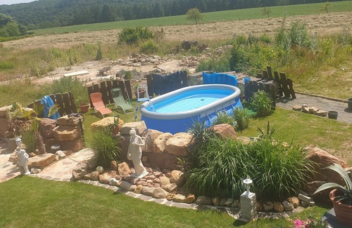 Landscheid Casa | Vacation home "Palmenland " with sauna, whirlpool, small waterfall and water place