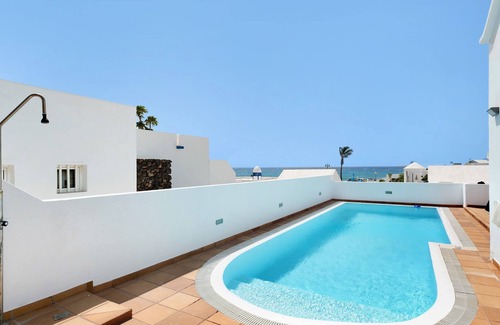Arrieta Villa | Casa vacacional 'Turqué' con vistas al mar, piscina y Wi-Fi