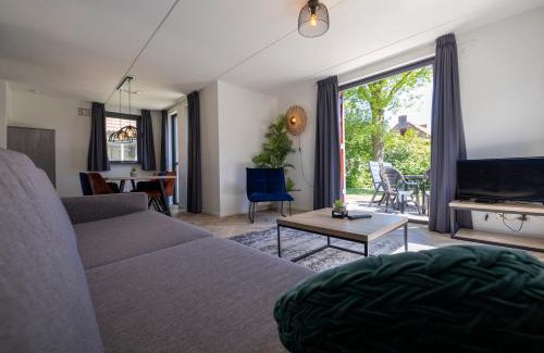 Ewijk Casa | Vacation house with sunny garden near lake