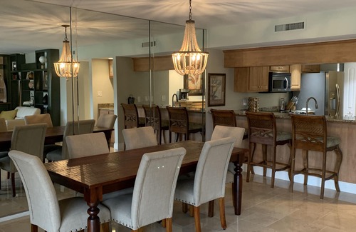 Biggar Condominio | Vacation in the Forest CC heated pool view of golf course near beaches airport