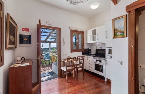 Las Lagunetas Apartamento | Vacaciones 'Junior Suite' con vistas a la montaña, Wi-Fi y aire acondicionado