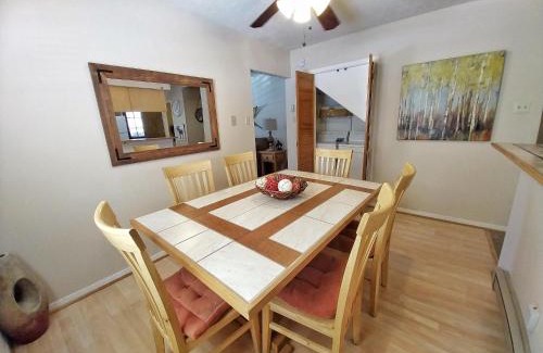 Red River Casa | Valley Condo 126 - Creekside - WiFi - Hot Tub - Fireplace - Washer - Dryer - Playground