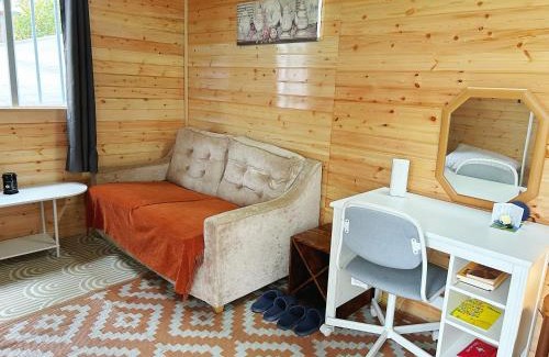 Ahascragh Otro | Valley view cabin in the woods on a farm
