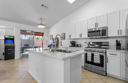 North Las Vegas Casa | Vegas Trip 5BD Home: Spa, Arcades, and More!