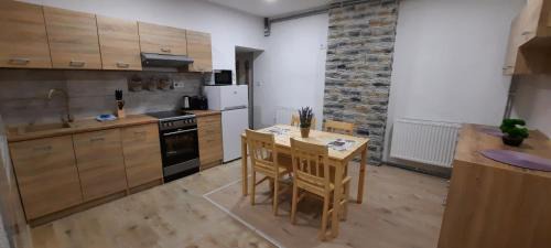 Rumburk Apartamento | Vejminek pod smrkem